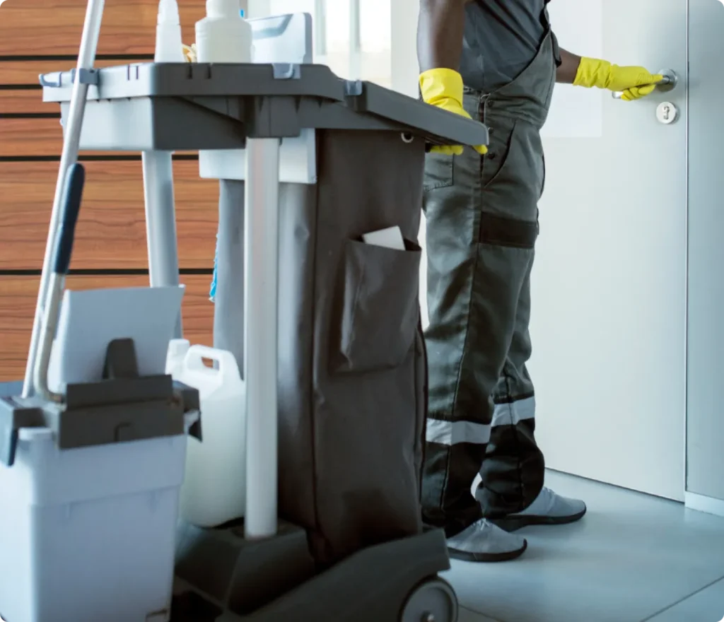 Professional janitorial staff with a fully equipped cleaning cart providing premium Commercial Cleaning for Beeyond Facility Services in Northern Virginia.